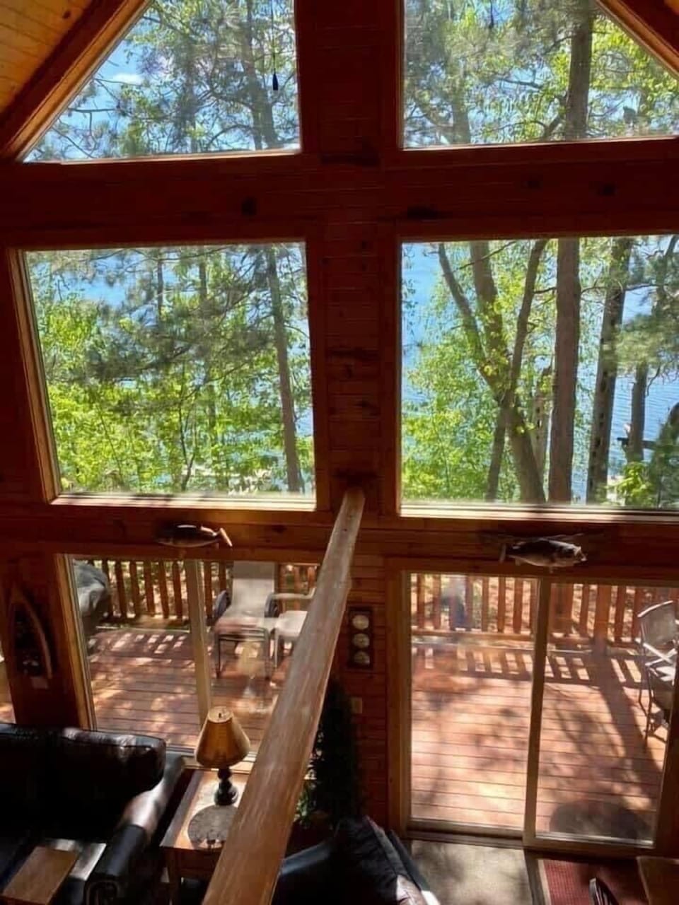 Beautiful large chalet window facing Round lake.