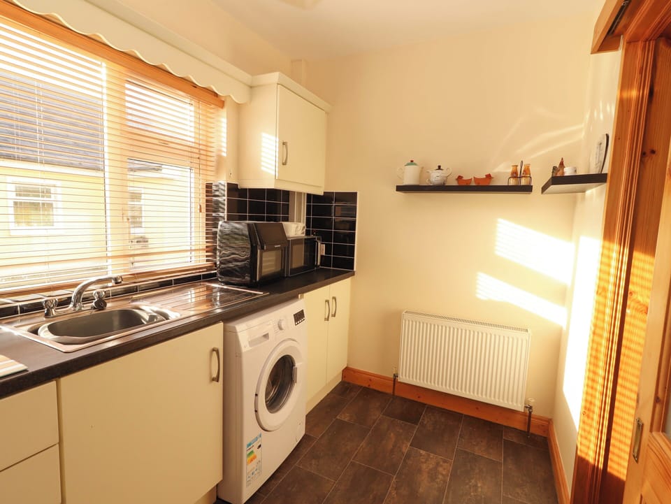 Fridge, microwave, cookware/dishes/utensils