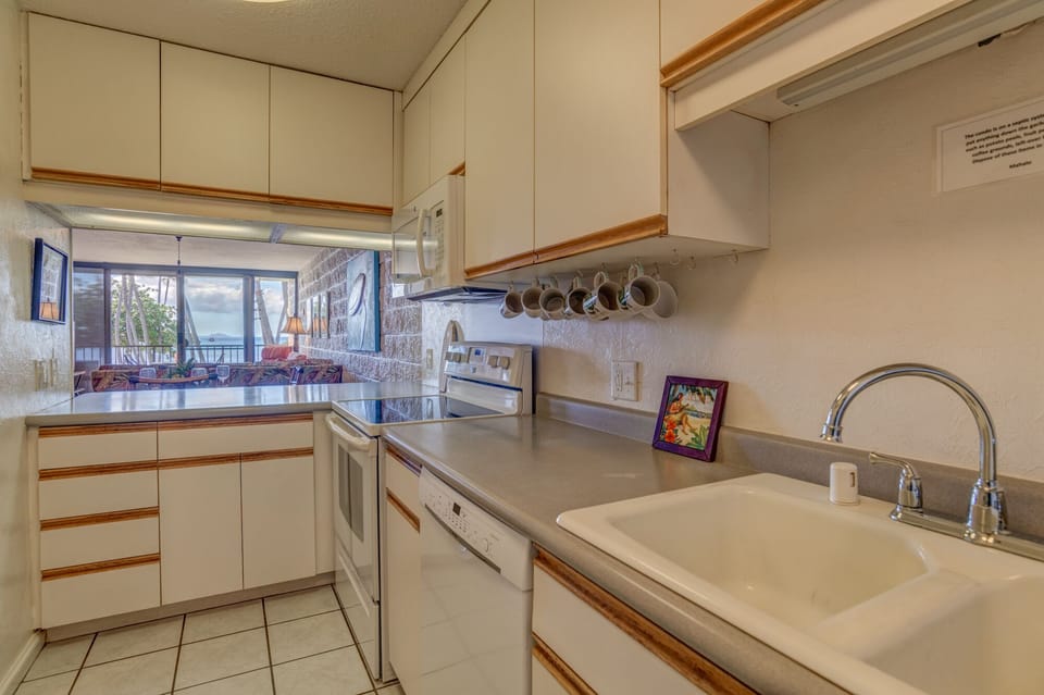 Bright white kitchen has everything you need to make all your meals in house