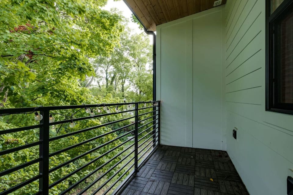 Balcony area with outdoor seating and city views