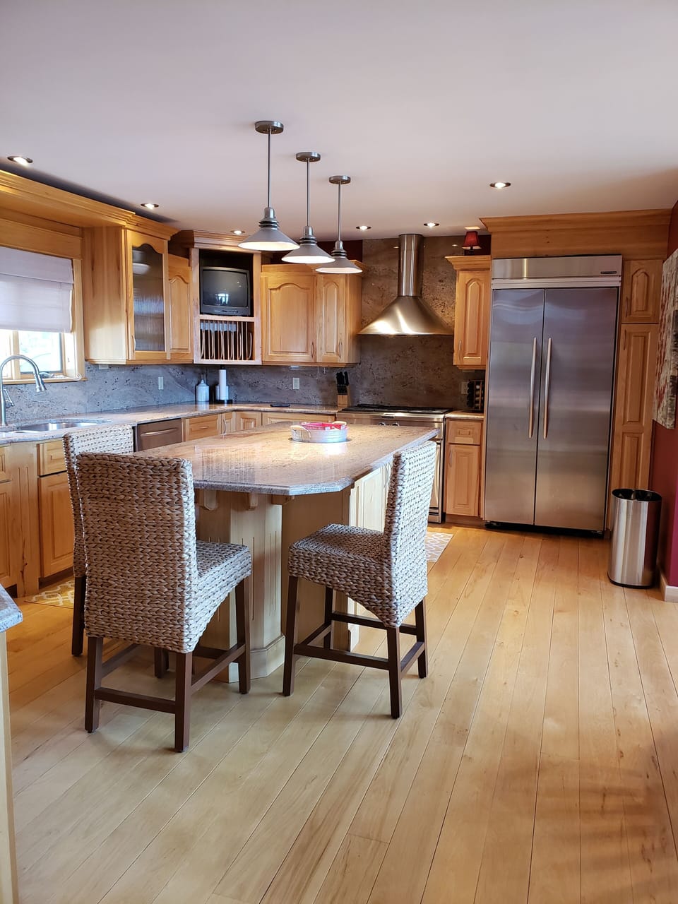Fully equipped kitchen featuring a 6-burner gas stove top.  A chef's delight!