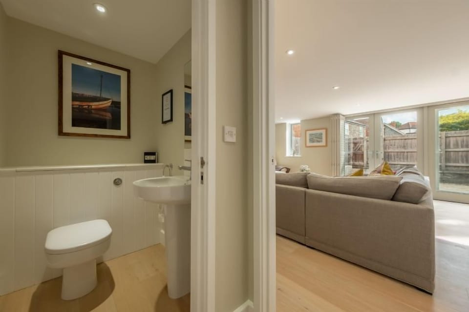 Ground floor: Cloakroom with wash basin and WC