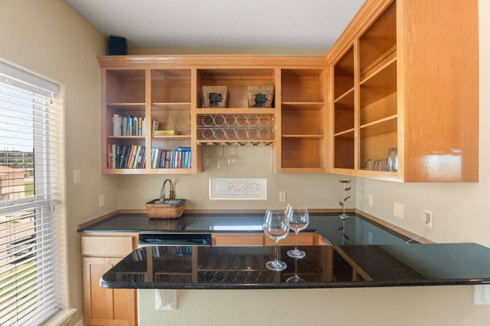 Main Floor Wet Bar with Seating & Storage