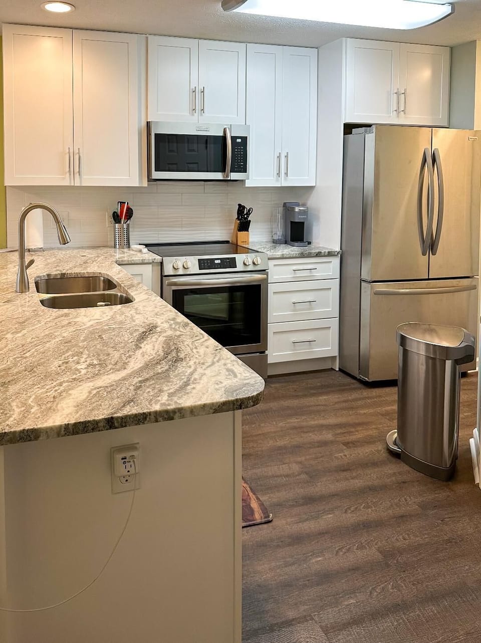 BRAND NEW renovated kitchen with stainless steel appliances & marble countertops