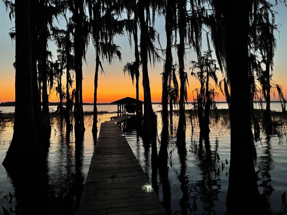 Magnolia property faces west for nightly extraordinary sunsets.