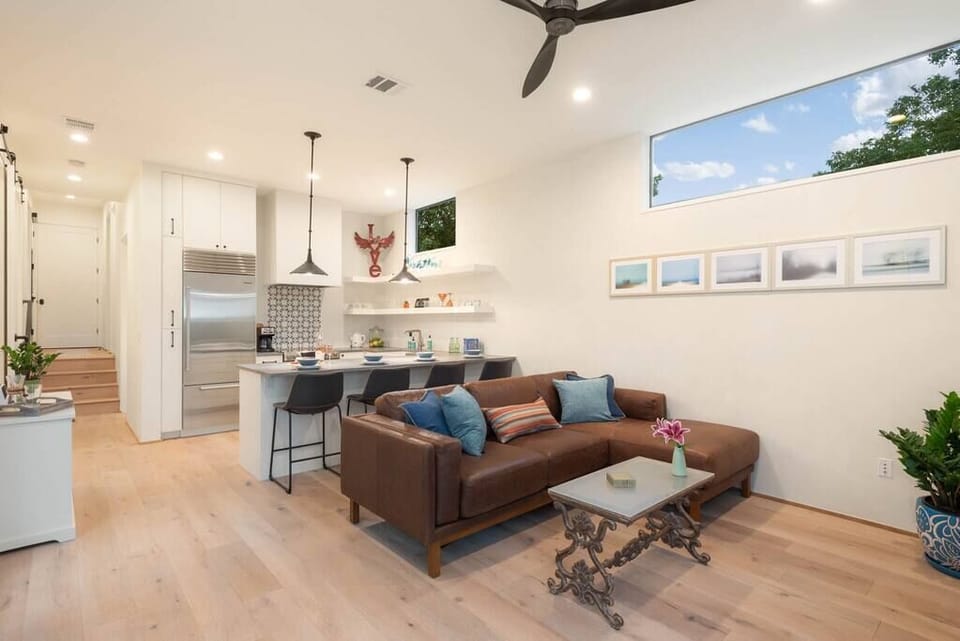 The kitchen is open to the living room — convenient for cooking and chatting