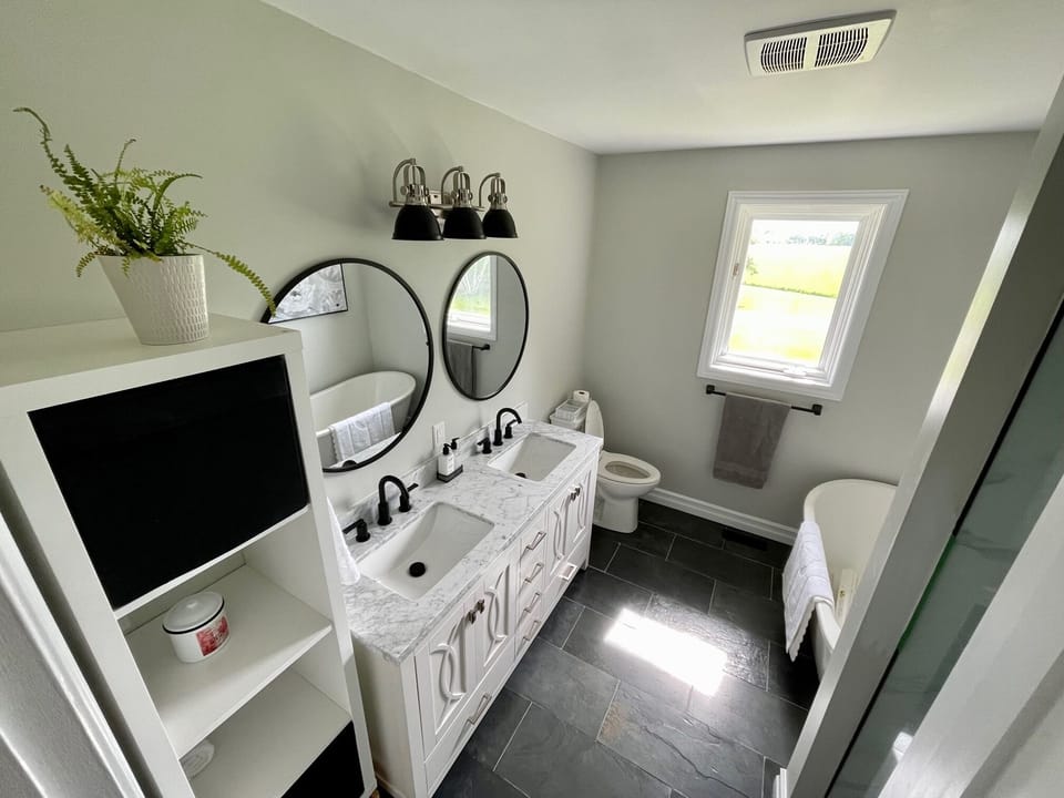 Main Level bathroom with stand up shower and soaker tub!