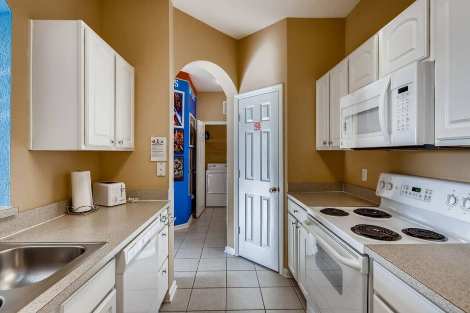 Cook your favorite meals in this inviting kitchen.