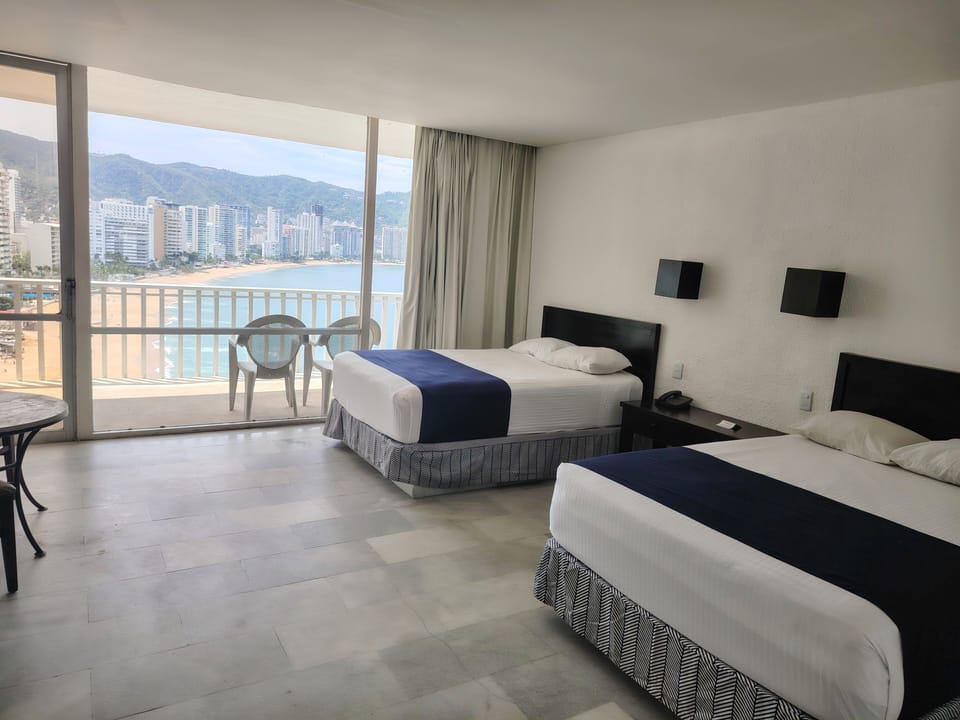 Standard Room, Beach View | 1 bedroom, individually decorated, individually furnished, free WiFi