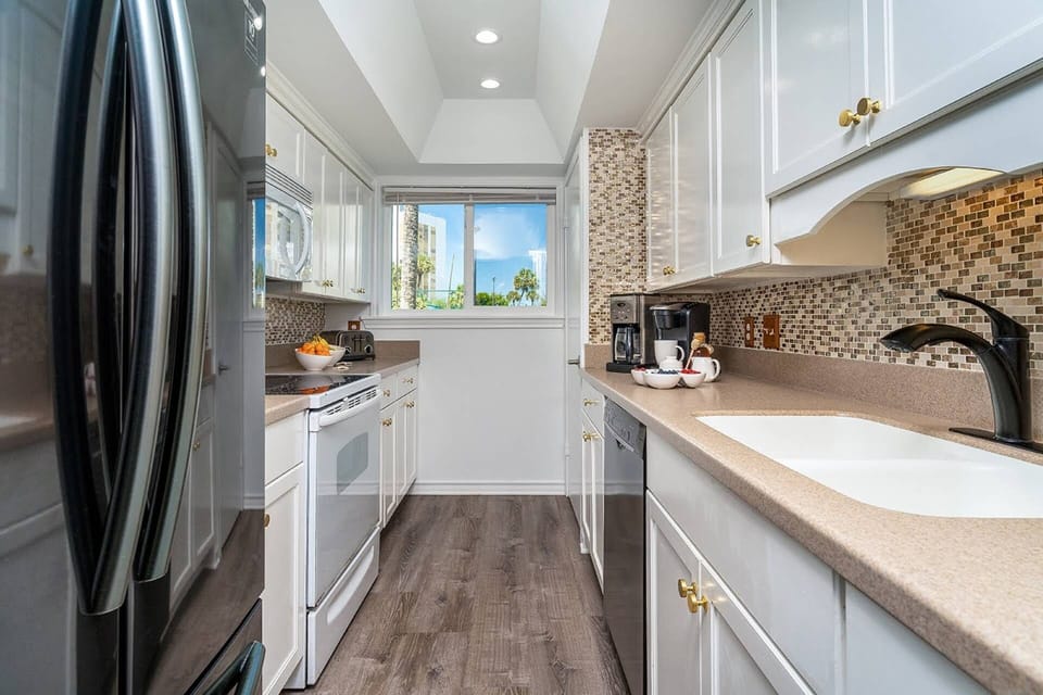 Kitchen with Refrigerator, Electric Oven & Cooktop, Dishwasher & Microwave