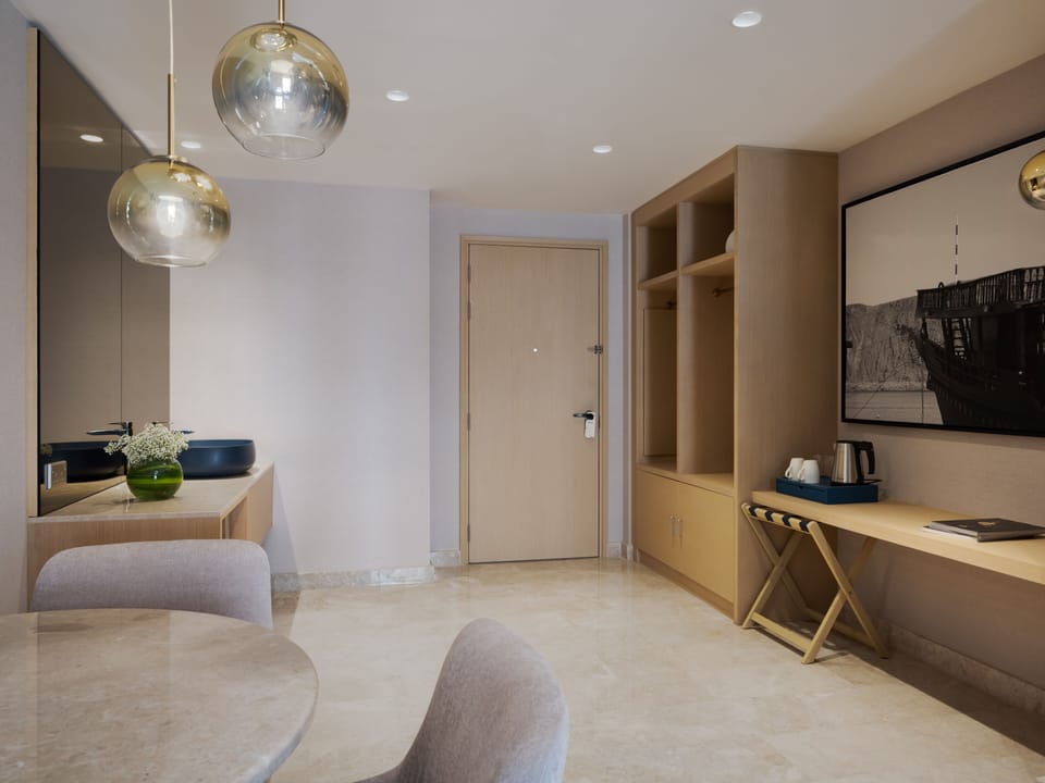 Superior Suite, 1 Bedroom, Pool View | Minibar, in-room safe, desk, blackout drapes