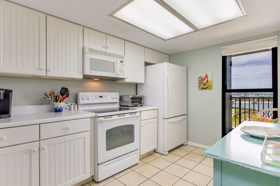 Open kitchen with skylight at Wind Drift Orange Beach vacation rental