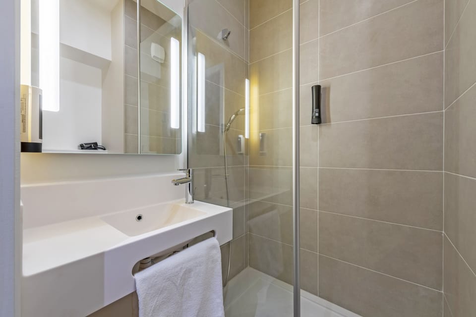 Shower, towels, soap, shampoo