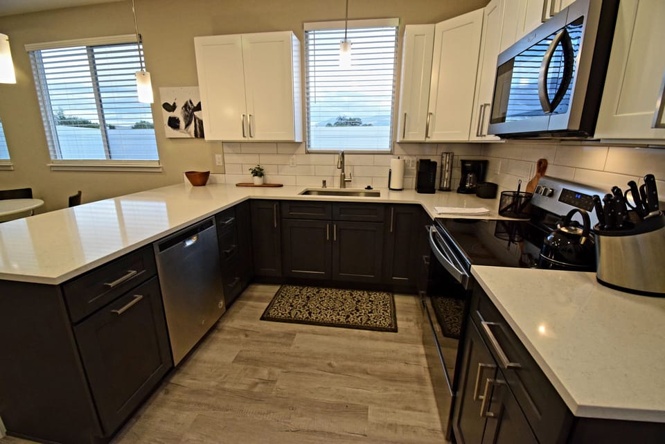 Kitchen with large, farm sink. Beautiful views of the Grand Mesa/Mount Garfield.