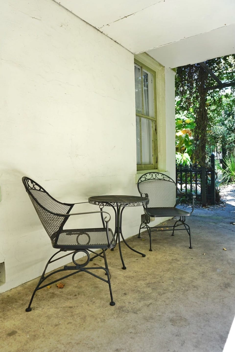 There are multiple seating areas throughout the covered terrace.
