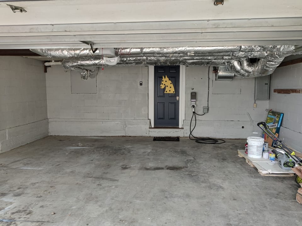 Enjoy a private garage (Max Hight 74in) with EV Charger
