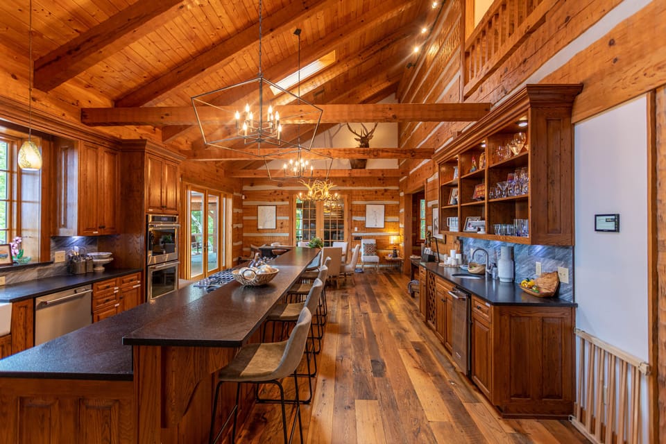 Fully stocked kitchen with formal dinning area and kitchen bar.