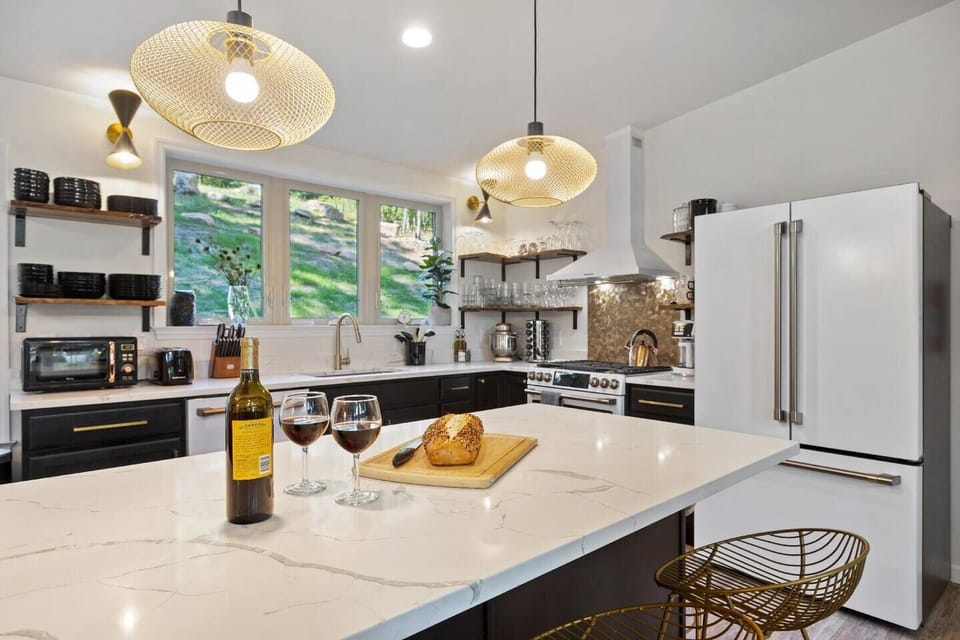 The kitchen island with quartz countertops is a great place to gather, prep meals together or eat a bite with those you love most!