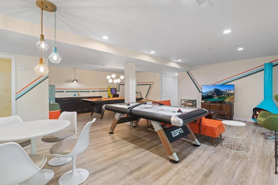 Our GROOVY retro game room will sure to be a hit for old and young alike with all we offer in such this hip space! We offer air hockey, pool, skee ball and pack man along with a lot of toys for the kiddos!
