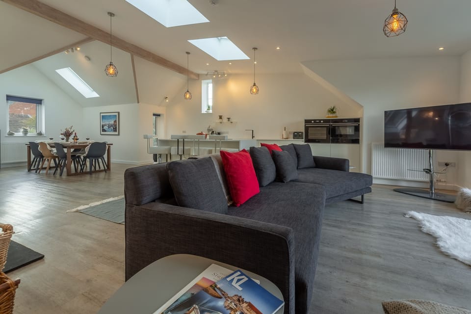 First floor: Sitting area to kitchen and dining area
