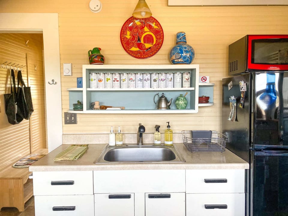 The kitchen is colorful and bright, with accents from around the globe.