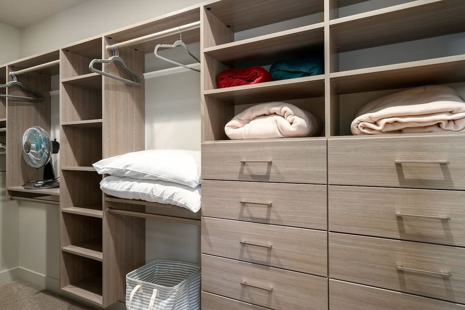 Walk in closet in the Primary King Suite