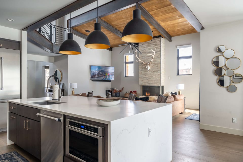 Living area leads into the dining area and kitchen
