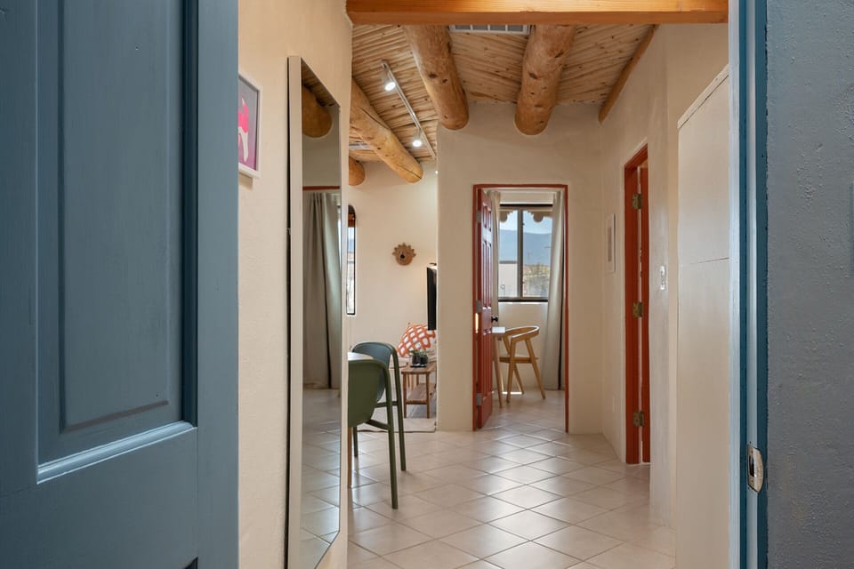 View from bathroom into living room/master bedroom.