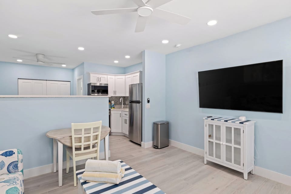 Captain Ed's Cottage- Gorgeous Residence at Palmview Inn of Sanibel featuring a king bed and queen sleeper sofa with memory foam mattress, in addition to a large bathroom with walk in shower and fully equipped kitchen