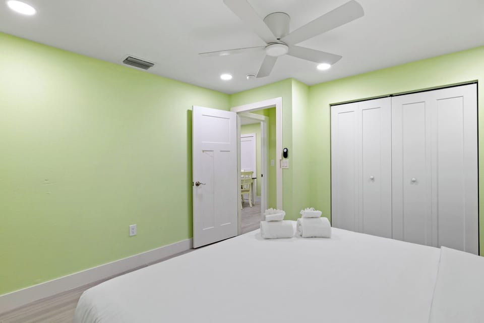 Pirates Cove cottage features an expansive living room with Braxton Culler memory foam sleeper sofa, full kitchen, bedroom with king bed, and bathroom with walk in shower