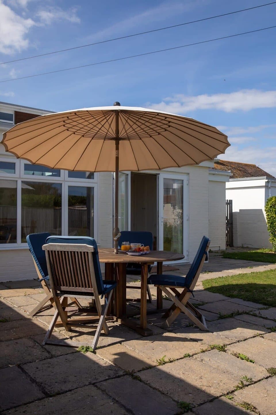 Soak up the sun, or seek shade under the parasol.