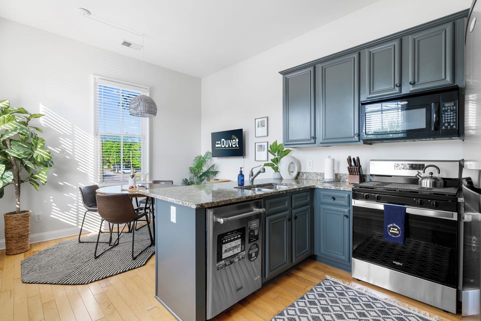 Fully Stocked Kitchen and bar top seating