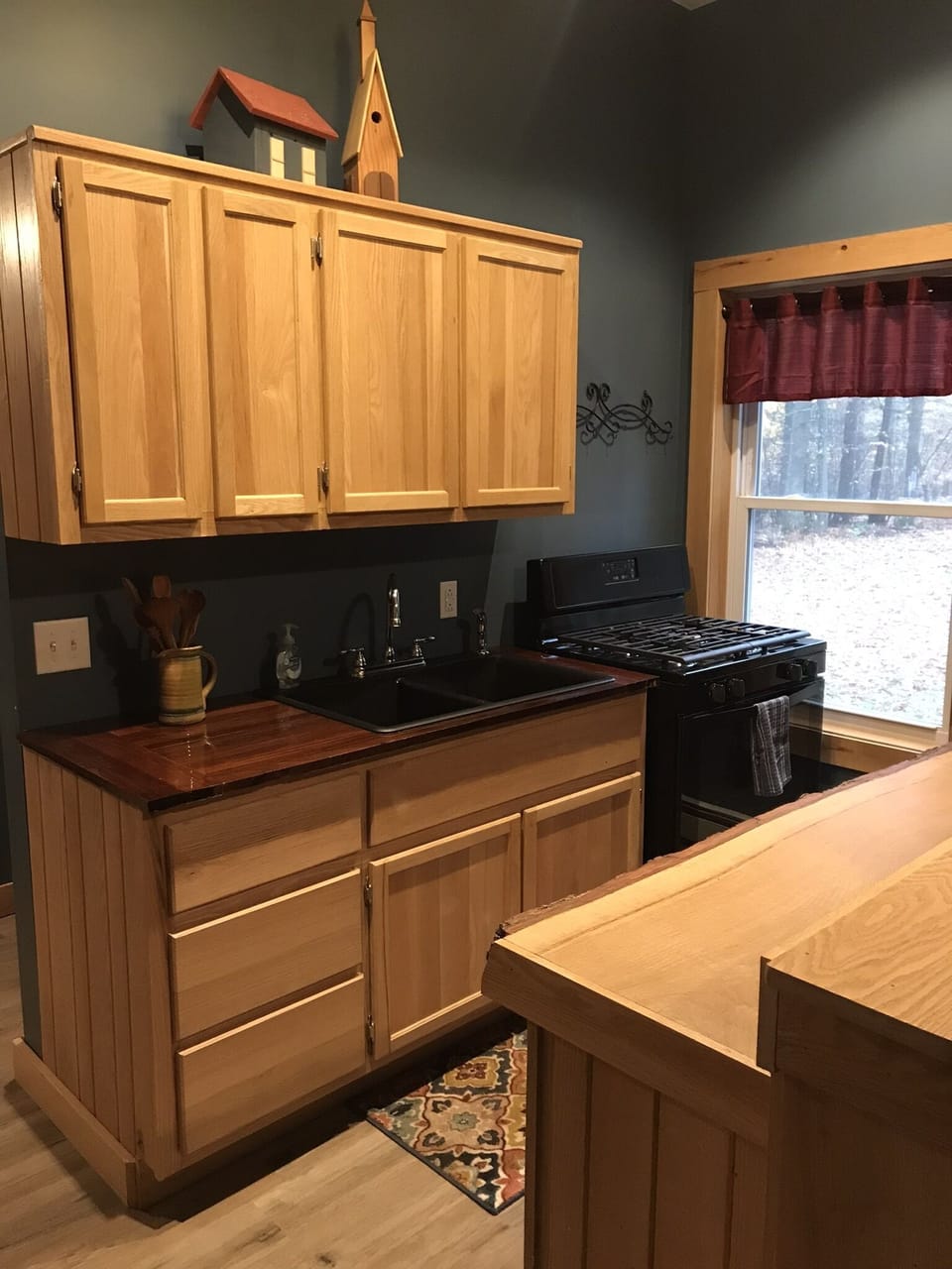 Kitchen with oak cabinetry