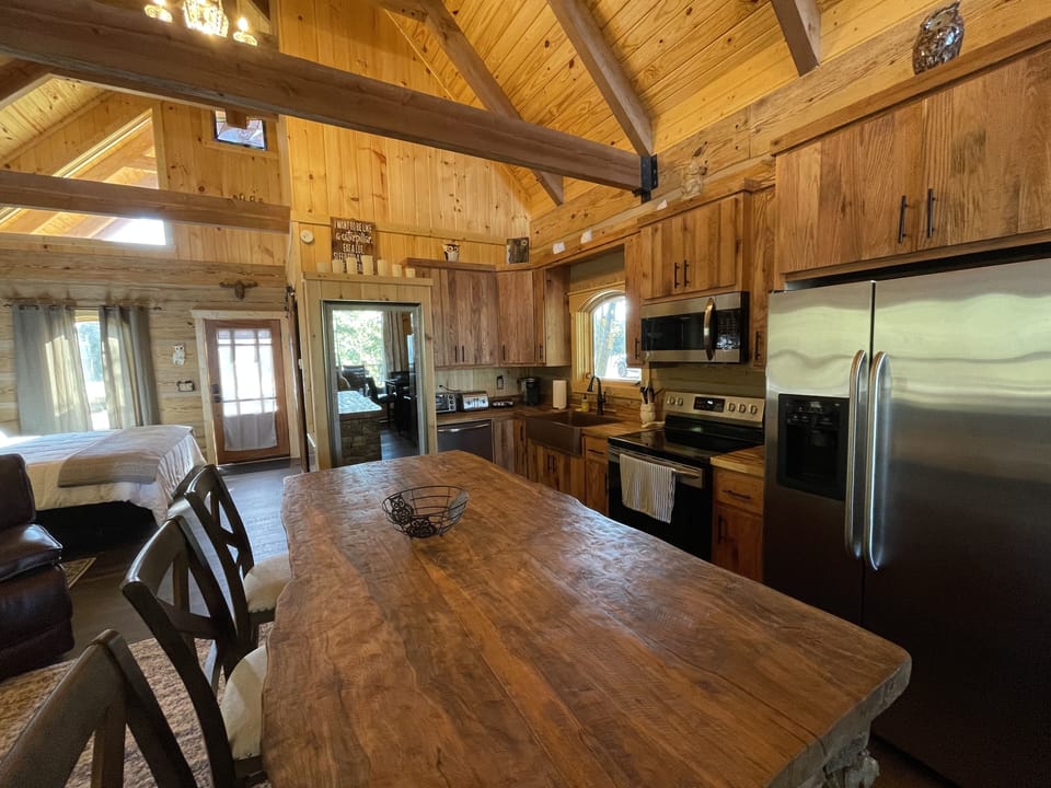 Handmade Bar fully stocked kitchen, ice maker in refrigerator.