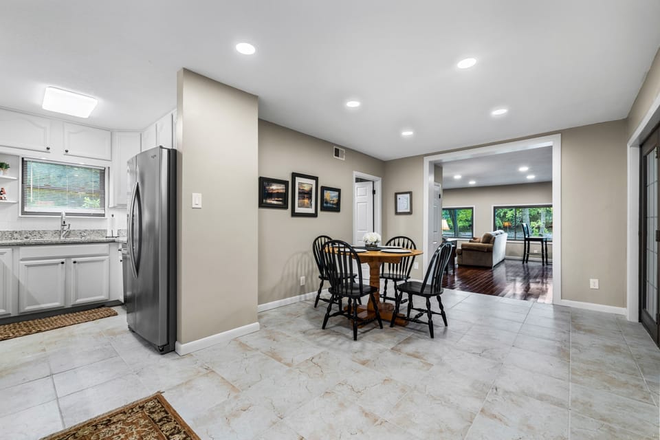 Eat in kitchen or enjoy a meal on the sunporch dining area 
