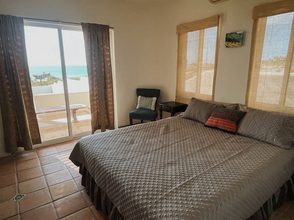 Bedroom 3 with queen bed and ocean views