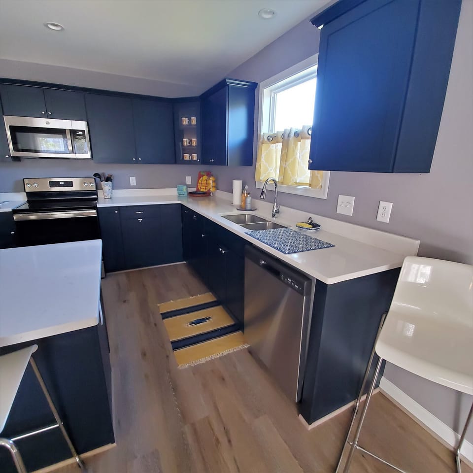 Stainless-Steel appliances. Pull-out shelving. Spices & coffee condiments incl.