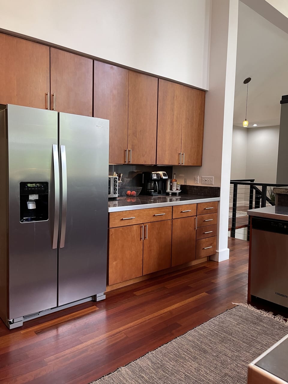 Main level Kitchen with serving bar. Drip coffee pot and Keurig provided.