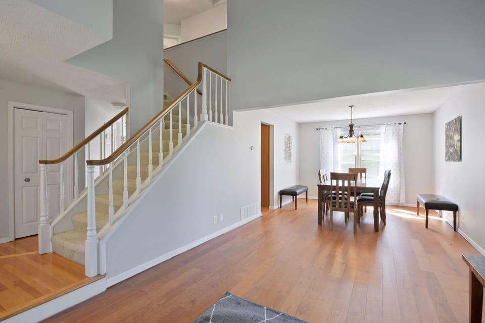 Open Stairway and Formal Dining Area