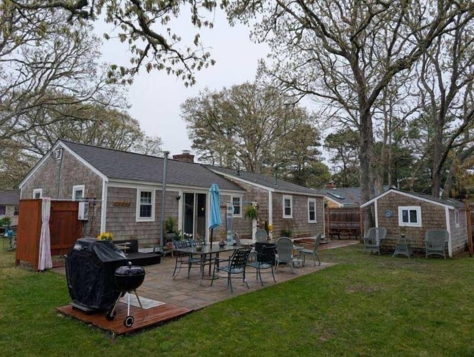 Back patio for grilling or playing corn hole making memories
