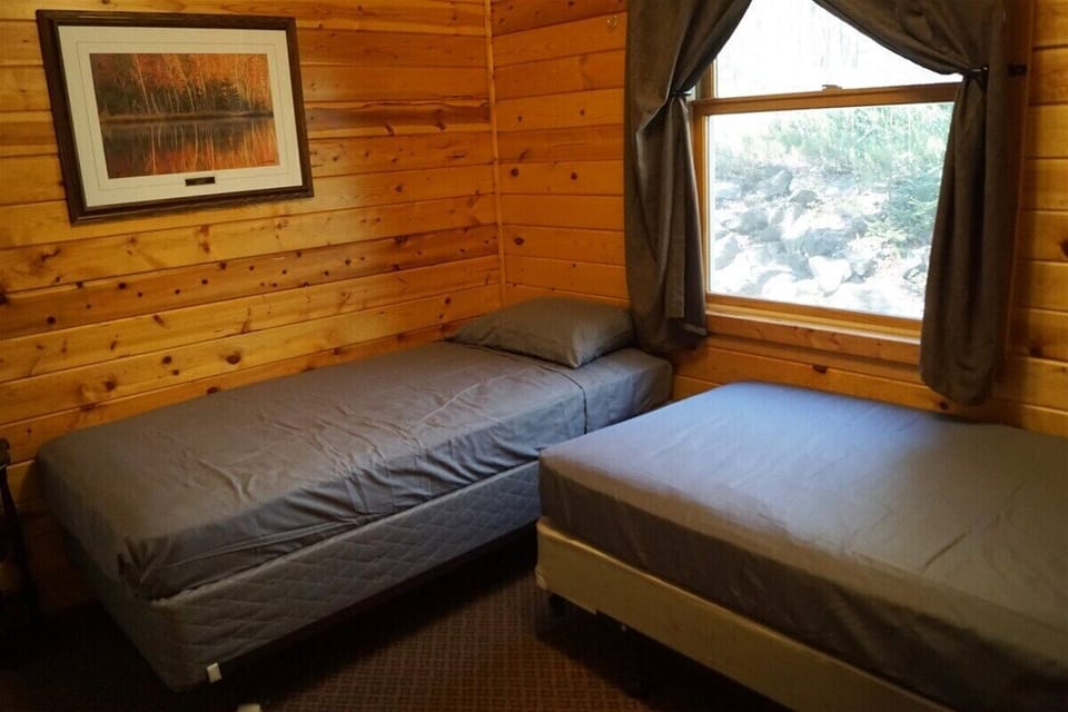 Bedroom 2 has 2 twin beds.