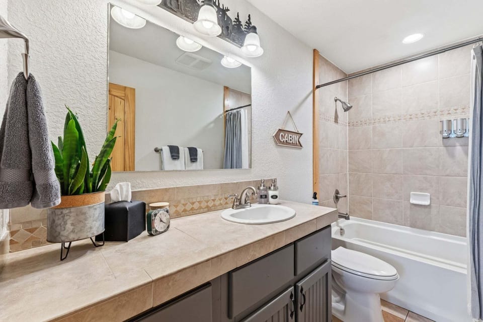 Upstairs Bathroom – A full bathroom conveniently located near the upper-level sleeping spaces.
