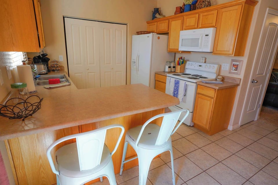 Kitchen with a bar