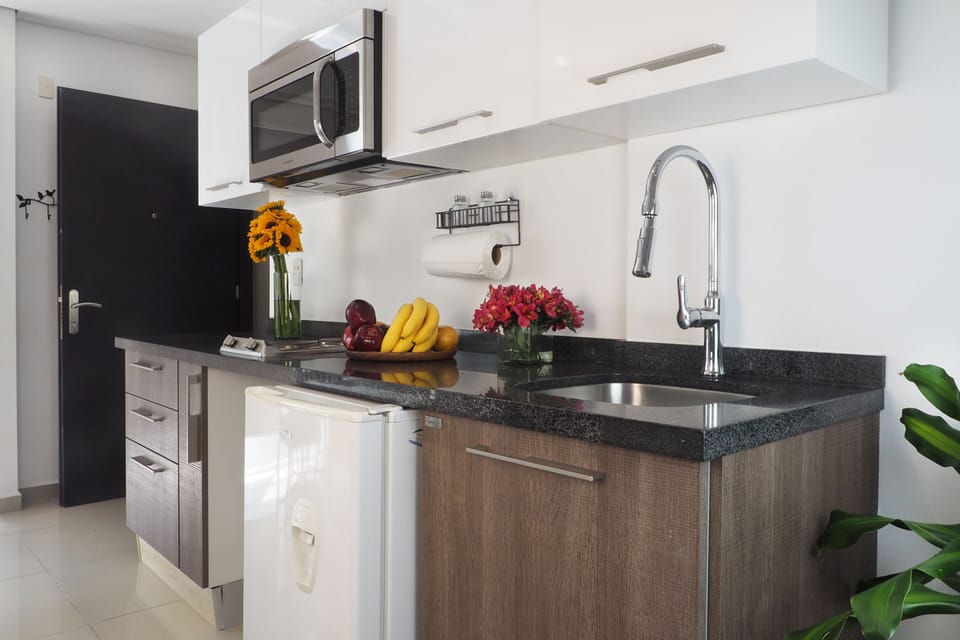 Basic Suite | Private kitchen | Mini-fridge, microwave, stovetop, coffee/tea maker
