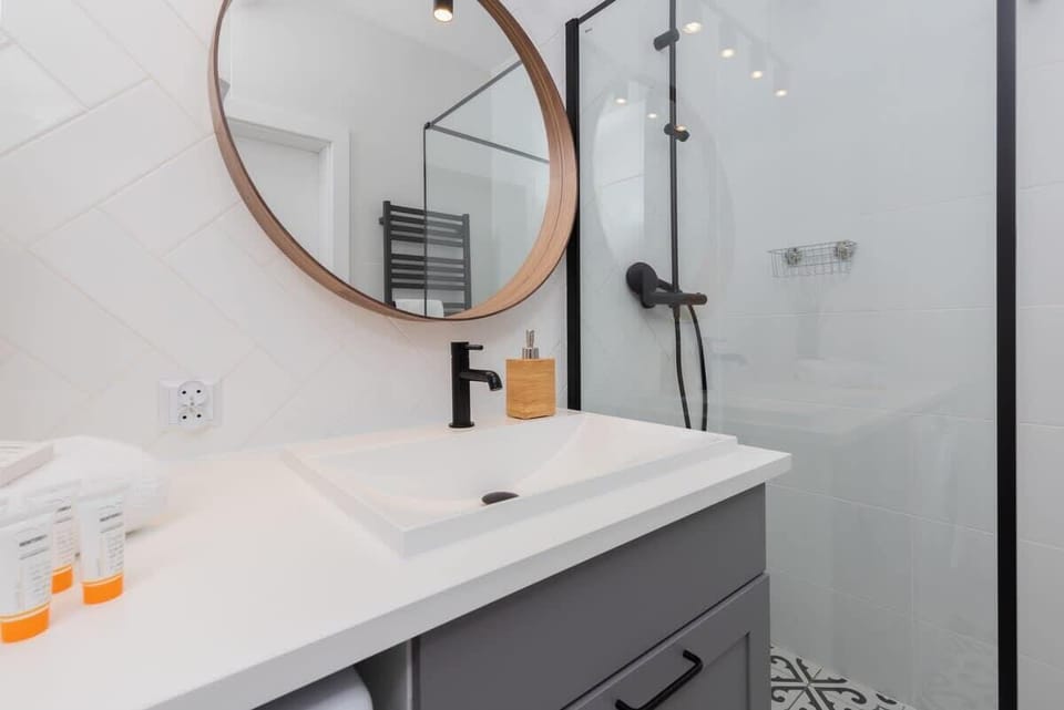 Bathroom with a mirror.