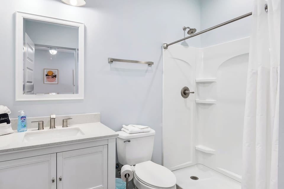 Private bathroom #3 for bedroom #3 includes shower/tub combo.