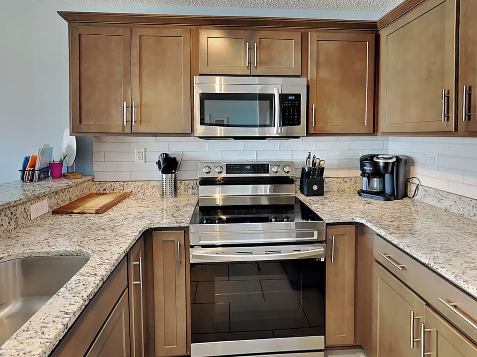 Fully Equipped Kitchen with Stainless Steel Appliances
