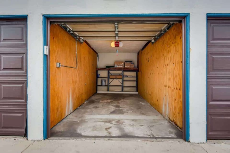 You will have 2 free parking spots. One compact car parking spot inside the garage, and one driveway spot in front of the garage.