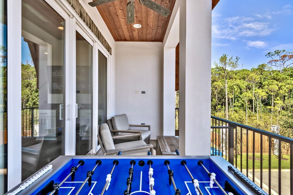 Resort-Style Pool & Clubhouse — Enjoy exclusive access to the 90-ft HEATED community pool, cushioned lounge seating, covered pavilion with 7 Green Egg grills, large dining tables, and big-screen TVs—perfect for relaxing, cookouts, and group gatherings.