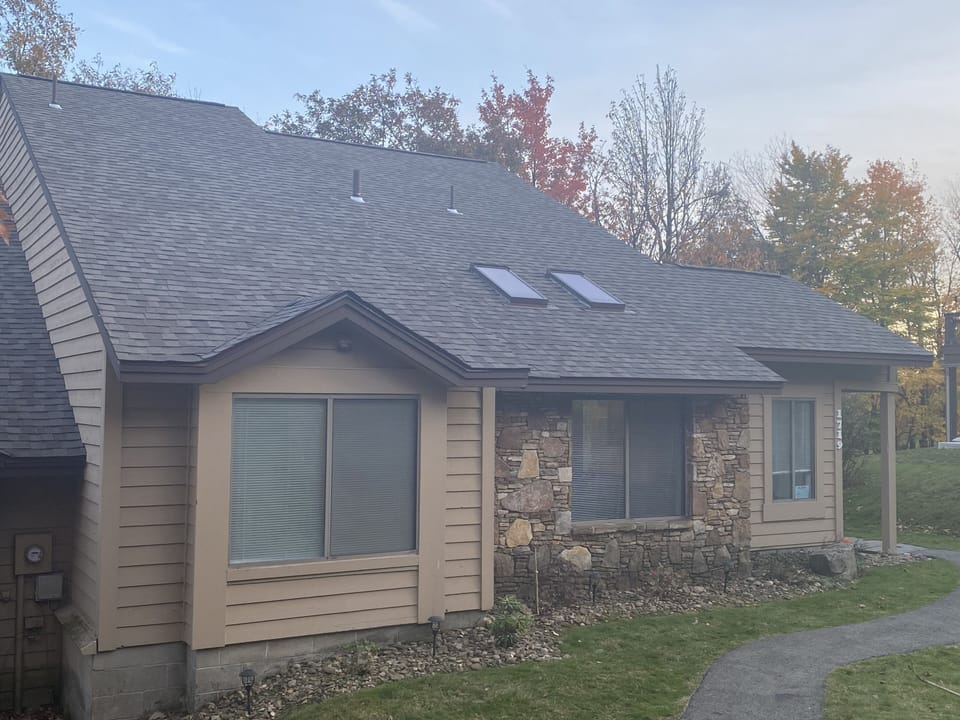 Fall 2025 picture after installation of new roof and rain gutters.